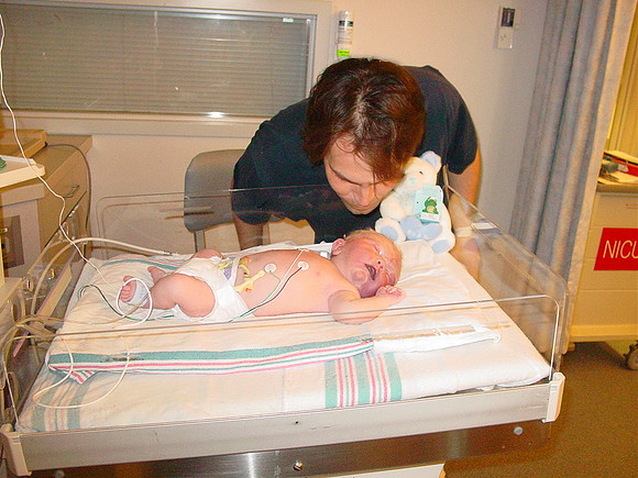 Tim kisses baby Justin